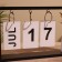 Souvenir eternal calendar, wood, 4x24x14 cm, col. black
