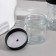 A set of bathroom accessories, 4 items (dispenser, glass for brushes, 2 jars), black color