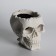 Figure candle in concrete "Crying Skull", black