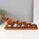 Polystone souvenir "Five elephants on a stand" under a tree 6.3x31x12.5 cm