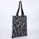 A shop bag on a rave without a zipper, without lining, black color