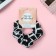 Hair elastic band "Orbit" large cage, 9 cm, black and milk