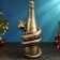 The piggy bank "Snake with champagne" Black gold, 35x16x16cm