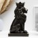 The piggy bank "Leo with the crown" black with gilding, 23cm