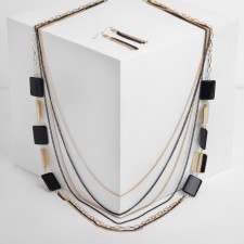 Set 2 objects: earrings, unison beads rectangles, black color in gold, 80cm