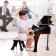 Musical toy "piano", black color