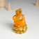 Polystone souvenir "Orange snakes with flowers on coins" 6x5.8x8.8 cm