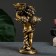 The candlestick "Angel" in the left hand, gold, 14x8x22 cm, for a candle d = 4 cm