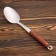 Serving spoon with a wooden handle 35 cm, scooped 7x11 cm