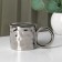 Ceramic mug with a spoon "Stylish Bear", 320 ml, silver color