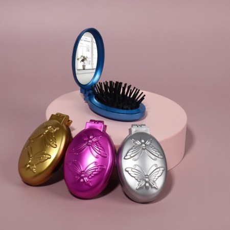 Massage comb “mother -of -pearl butterfly”, folding, with a mirror, 5.5 × 9 cm, color mix
