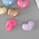 Busina for creativity plastic "3D heart with faces" Pastel mix 2.4x3.3x1.4 cm