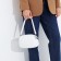 Bag Cross-Bodi with a zipper, white color