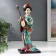 Collectible doll "Geisha in a flower kimono with a musical instrument" 30 cm