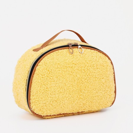 Cosmetic bag on lightning, with a lodge, yellow color