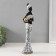 Souvenir Polystone "African in white with a golden jug and bracelets" 6x8.2x33 cm