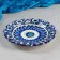 Plate of the Rishtan ceramics "Flowers", blue, embossed, 17cm