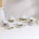 Tea Service "Flowering Strawberries", 14 objects: kettle, sugar tower, 6 tea pairs, porcelain