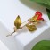 Brooch "Rose", red-green color in gold