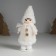 Interior doll "Baby in the lamb fur coat" 5.6x9x16 cm
