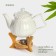A porcelain teapot on a stand from Bellatenero bamboo "Tulip", 700 ml, white color