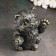 The piggy bank "joyful cat" is black, gold, 20cm