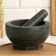 A mortar with a pestle made of stone is large, 1000 ml, black, in the box