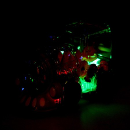 The locomotive "gears", light and sound effects, works from batteries-3