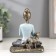 Polystone souvenir "Girl in the Lotus pose, with the cat" Blue 14x11x7.8 cm