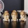 Polystone souvenir "Angel-girl with puffy cheeks thoughtful" mix 5.4x3.8x3.9 cm