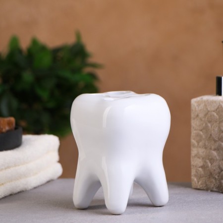 A glass under the toothbrush "Tooth"-1