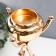 Summary Metal for 1 candle "Trinoga with a dome" gold 28x13x13 cm