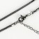 The pendant "Sophistication" ovals with a chain, black-gray color in gray metal, 65 cm