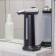 A dispenser for antiseptic/liquid soap, sensory, batteries, 400 ml, black color