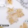 Brooch "Fern", white color in gold