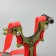 Metal slingshot with a laser target designator, compass