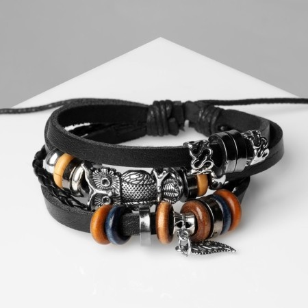 Bracelet Skin "owl" and leaf, black color, d = 6 cm