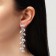 Hanging earrings with rhinestones "Blink" with leaves, white color in silver, 8 cm