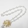 Pearl with pearls "bow" large, white color in gold, 70 cm