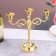 Three -rod, metallic candlestick, 26 x 10 x 27 cm