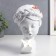 Polystone souvenir "Baby with lily in her hair and butterfly" White 23x17x7 cm