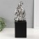Souvenir Ceramics "Boy with cello" silver 11.5x12x34 cm