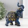 Souvenir Polystone "Blue Elephant in Popon with a golden pattern and mirrors" 14x7x11 cm