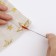 Needle for raising loops, 15 cm, red color