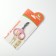 Coglit scissors curved with rubberized handles, a hole of 6 mm, pink