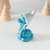 Polystone souvenir "Snake in a hat with hare ears" 3.5x6 cm