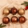 Set of balls Plastic D-8 cm, 6 pcs "Cornelia Assorted Patterns" golden brown