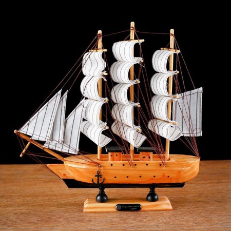 The ship souvenir medium "Ginder", board is light wood, white sails, 30x7x30 cm