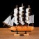 The ship souvenir medium "Ginder", board is light wood, white sails, 30x7x30 cm