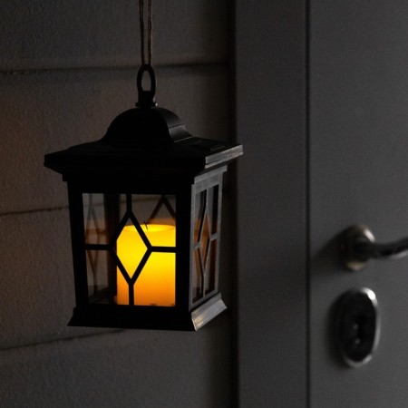 Lamp on the solar battery Uniel "Lantern" 14x22 cm, IP44, 1 LED, EFF. flame, t/white